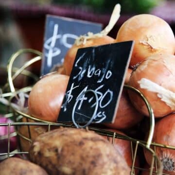 Onions in a basket for sale