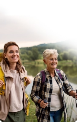 Health adult mother and daughter hike outside