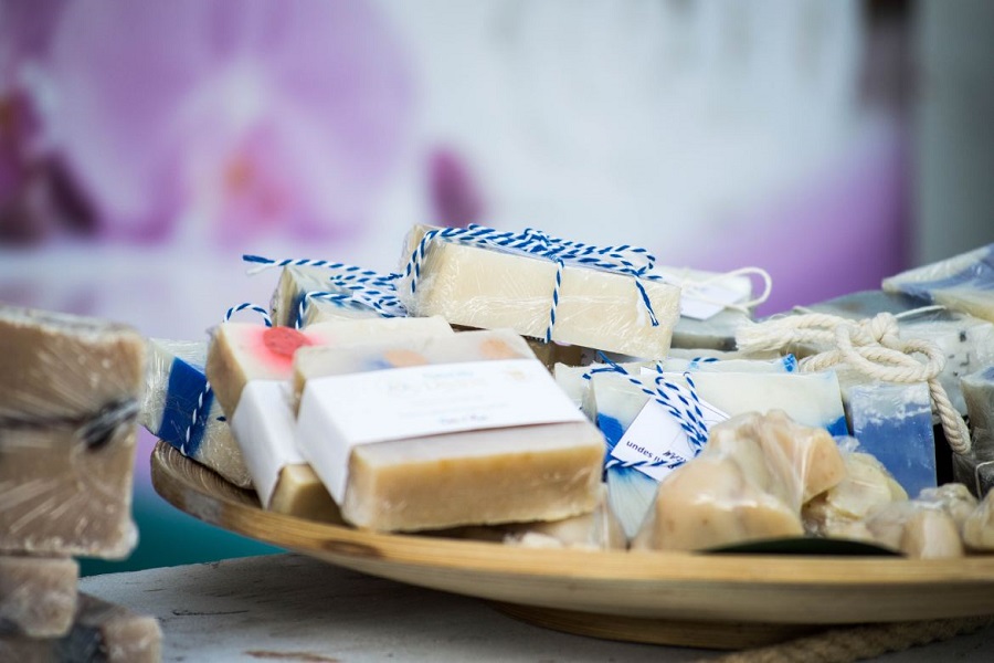 Wooden bowl full of natural soap